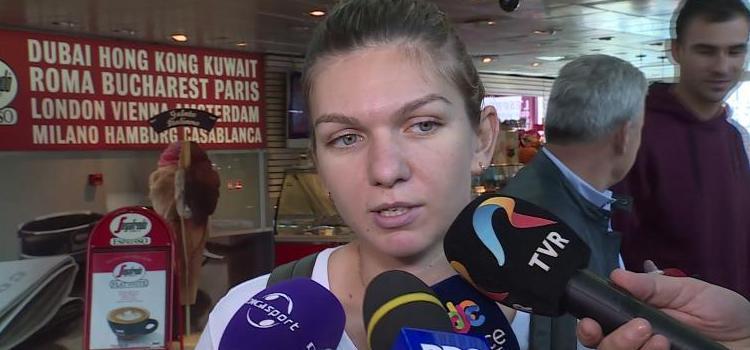 Halep a revenit acasă